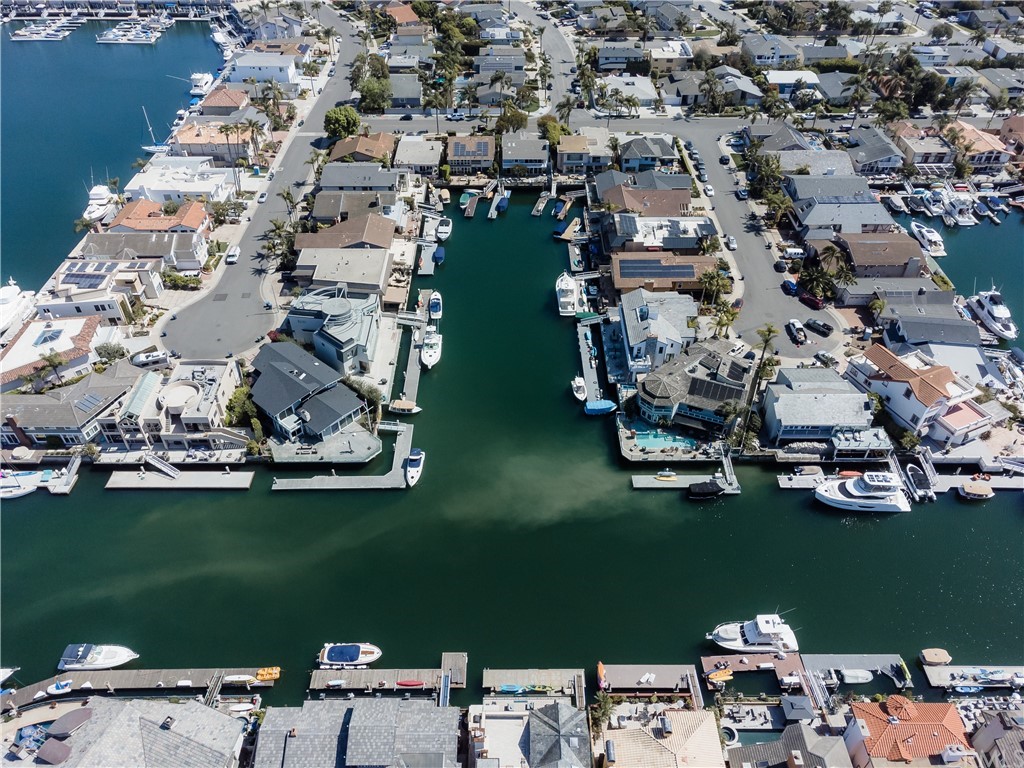 16631 Edgewater Lane Huntington Beach, CA 92649 - Photo 3 of 55 an aerial view of a house with a lake view
