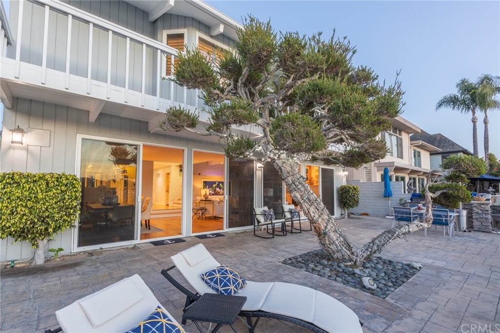 16631 Edgewater Lane Huntington Beach, CA 92649 - Photo 44 of 55 a view of a house with backyard