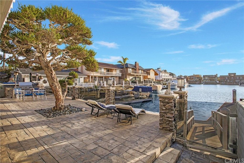 16631 Edgewater Lane Huntington Beach, CA 92649 - Photo 52 of 55 a view of a terrace with chairs