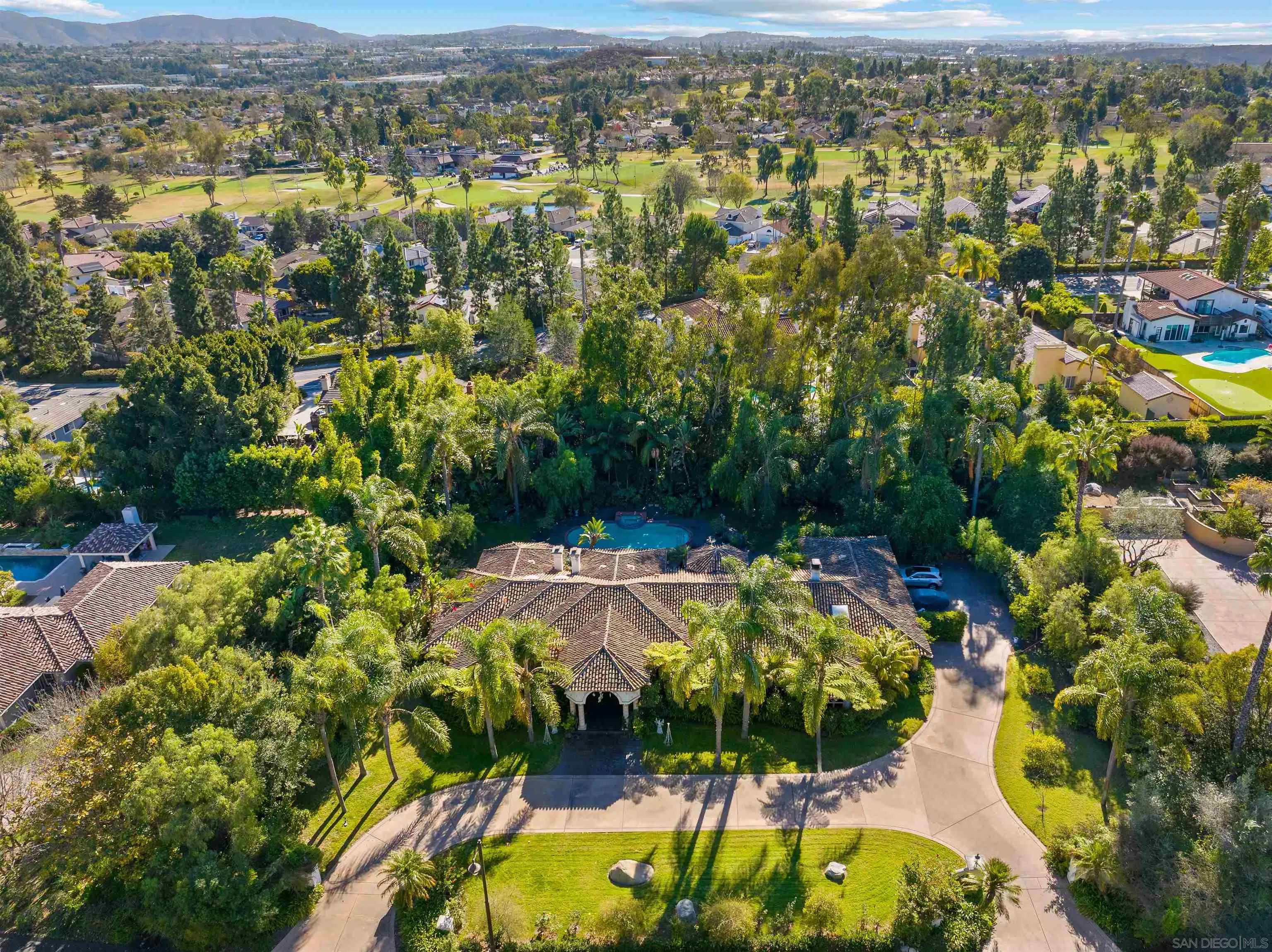 648 Rolling Hills Road Vista, CA 92081 - Photo 1 of 5 an aerial view of residential houses with outdoor space