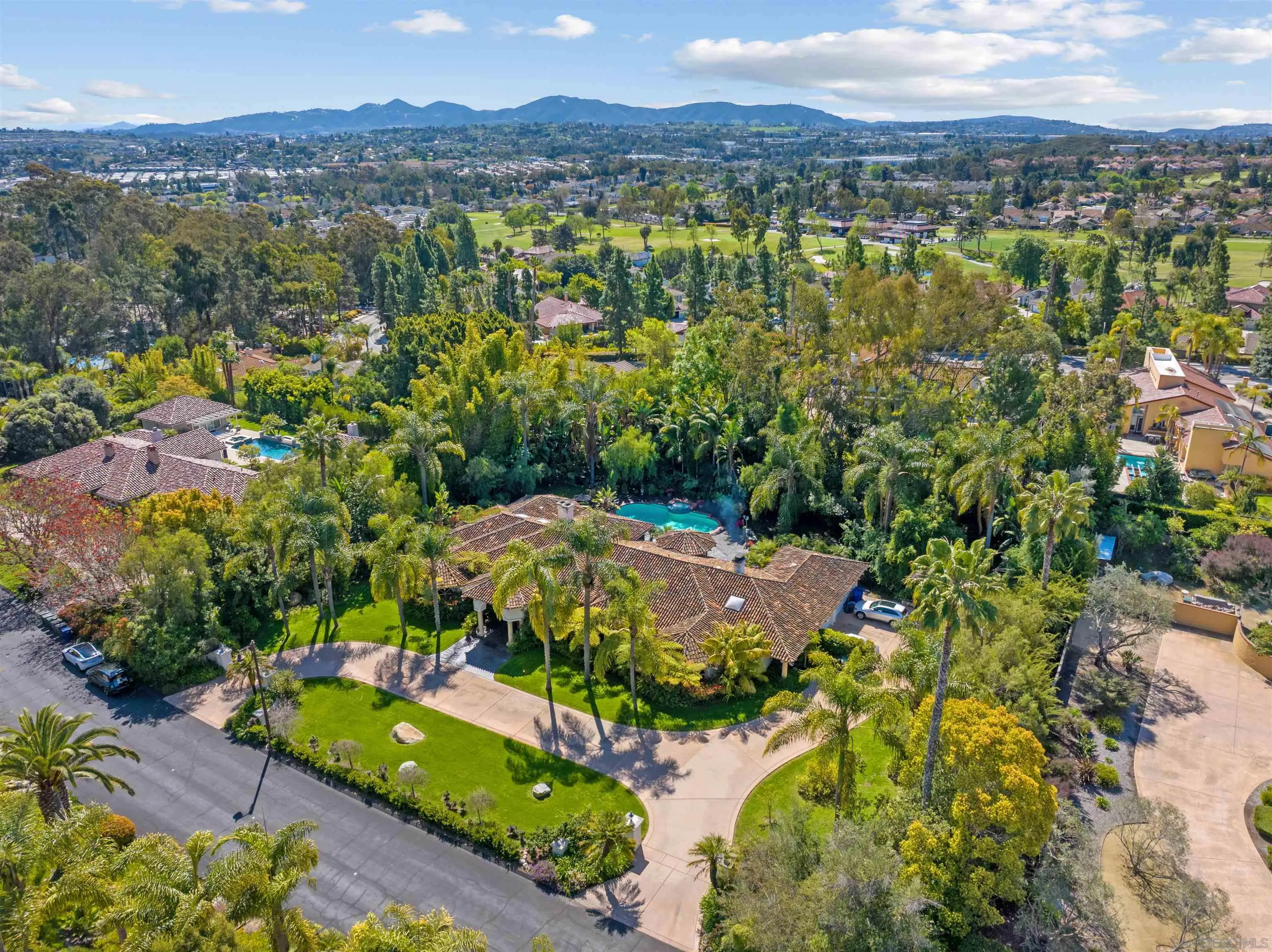 648 Rolling Hills Road Vista, CA 92081 - Photo 2 of 5 a view of a city with mountains in the background