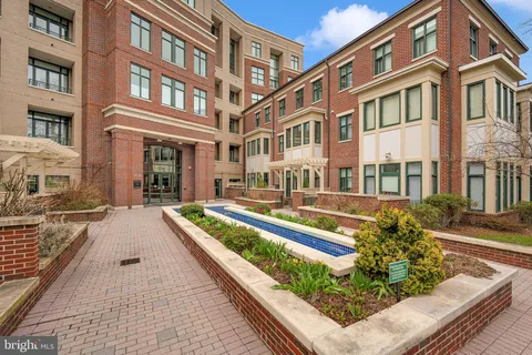 a view of an buildings with swimming pool