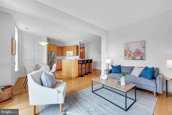 a bedroom with a bed and a chair
