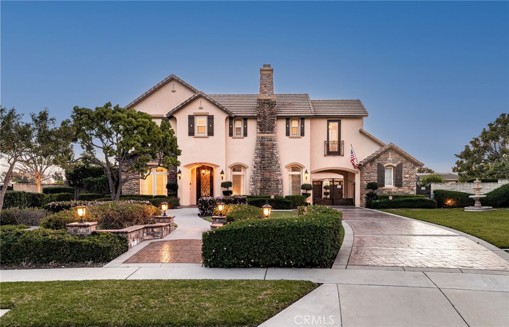 6364 Hidden Brook Place Rancho Cucamonga, CA 91739 - Photo 1 of 61 a front view of a house with a yard