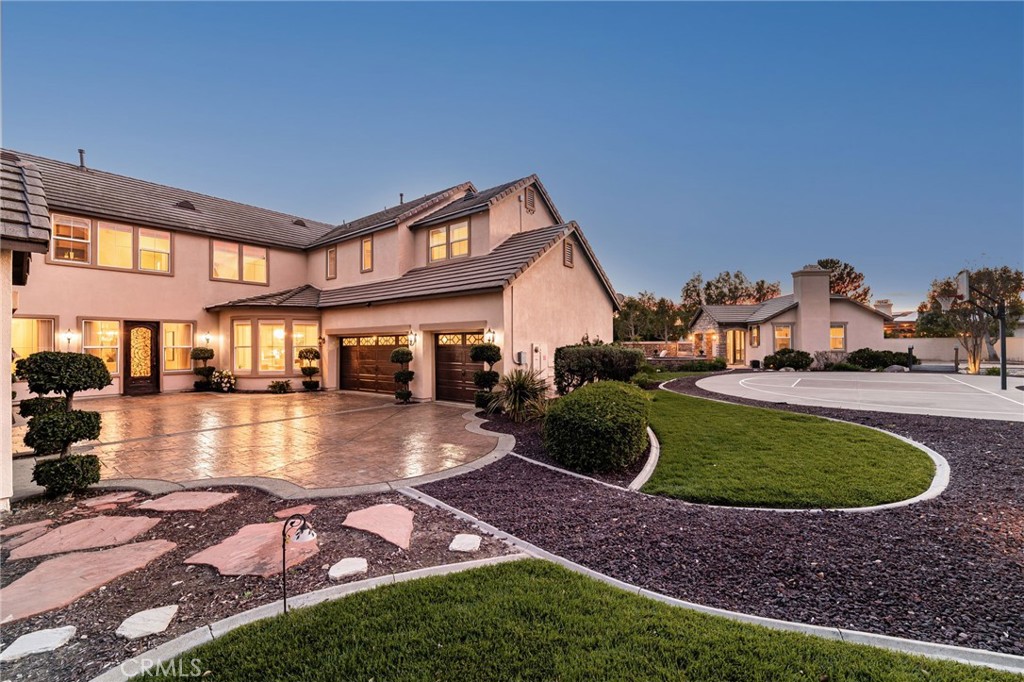 6364 Hidden Brook Place Rancho Cucamonga, CA 91739 - Photo 14 of 61 a view of a house with swimming pool