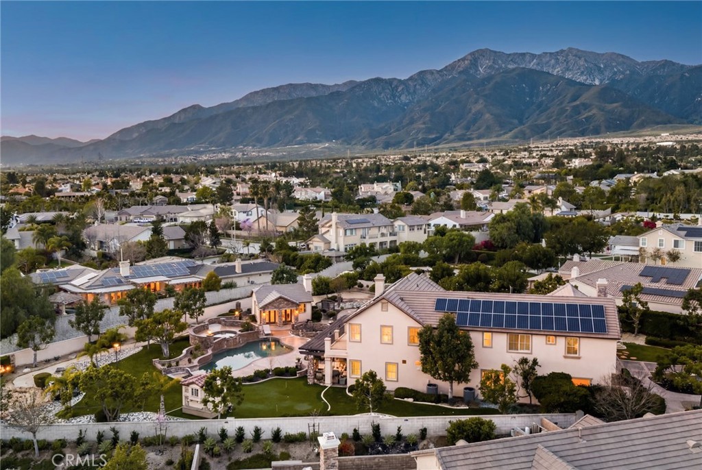 6364 Hidden Brook Place Rancho Cucamonga, CA 91739 - Photo 15 of 61 an aerial view of residential houses and city view