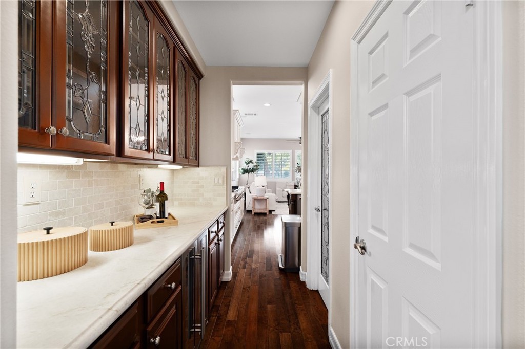 6364 Hidden Brook Place Rancho Cucamonga, CA 91739 - Photo 24 of 61 a view of a kitchen with a sink and cabinets