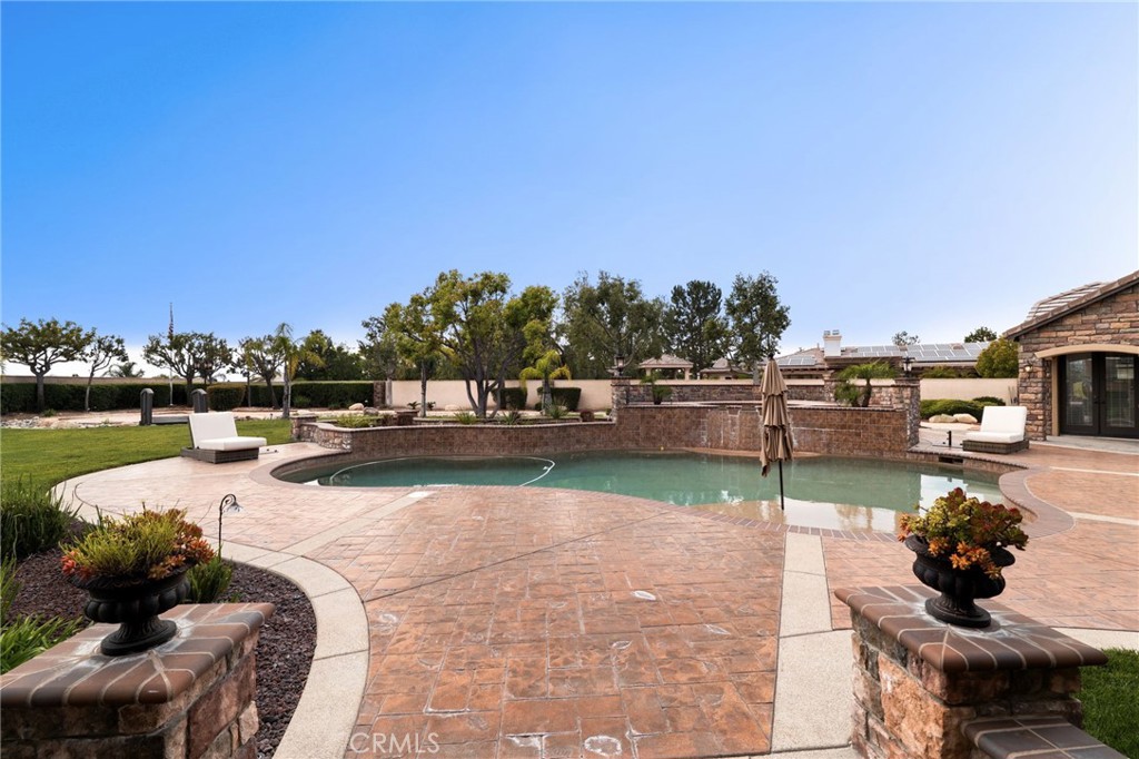 6364 Hidden Brook Place Rancho Cucamonga, CA 91739 - Photo 47 of 61 a view of swimming pool and outdoor space