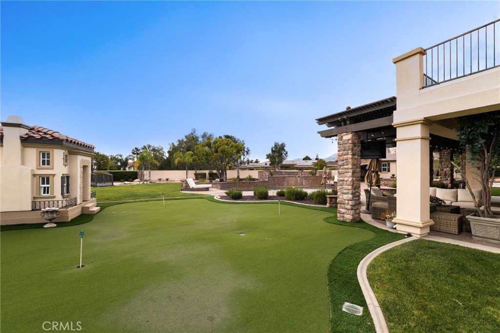 6364 Hidden Brook Place Rancho Cucamonga, CA 91739 - Photo 50 of 61 a view of a house with a big yard