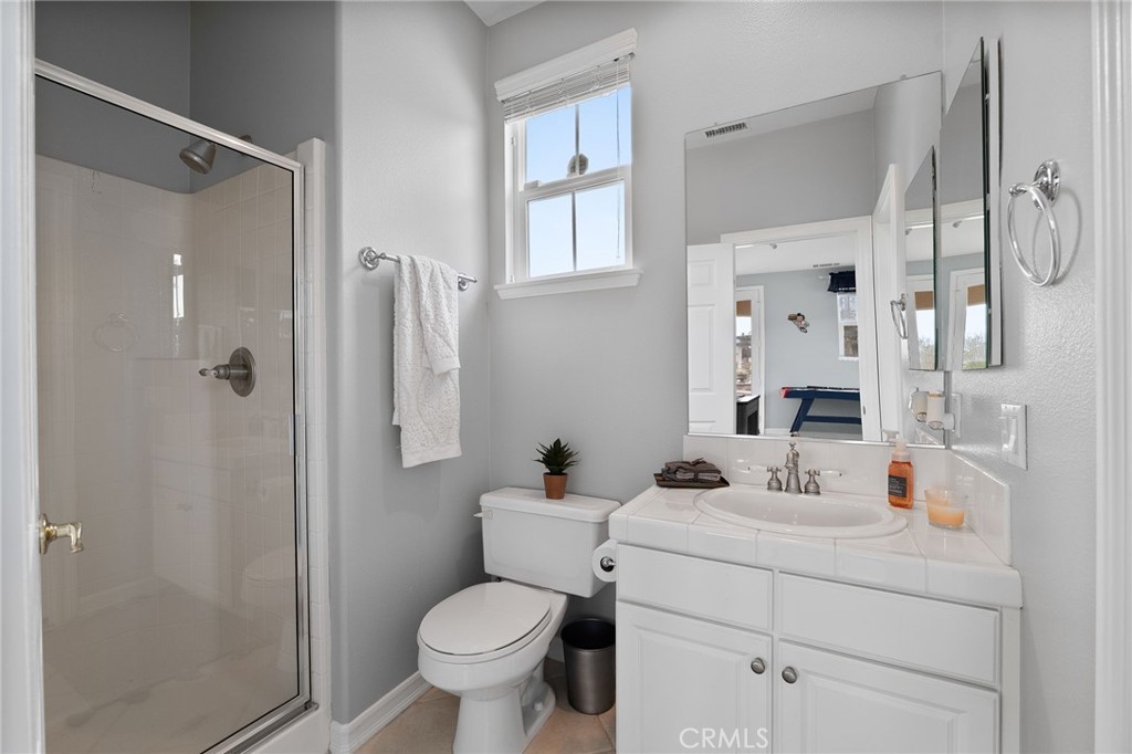 6364 Hidden Brook Place Rancho Cucamonga, CA 91739 - Photo 61 of 61 a bathroom with a sink toilet and shower