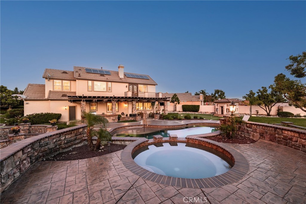 6364 Hidden Brook Place Rancho Cucamonga, CA 91739 - Photo 10 of 61 a view of a swimming pool with outdoor seating
