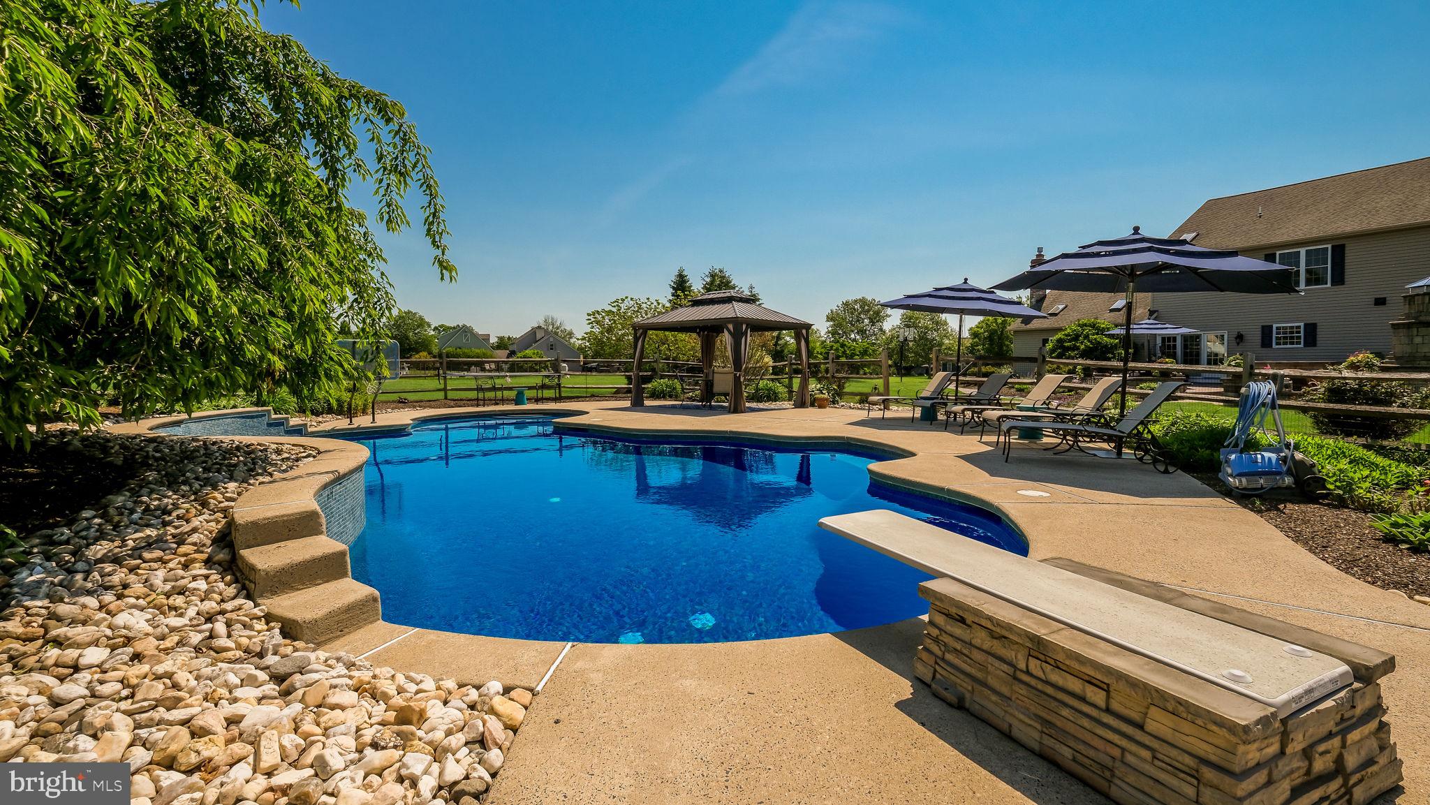 4805 Cheshire Road Doylestown, PA 18902 - Photo 53 of 89 Inviting In-Ground Pool with Diving Board