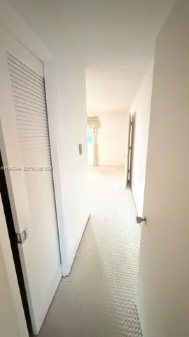 an empty room with a projector