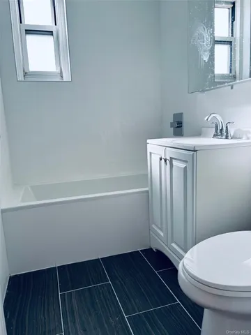 a bathroom with a sink and a toilet