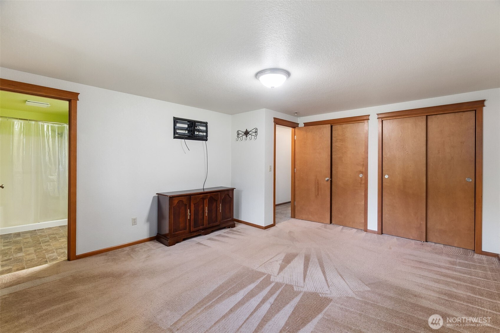 6107 189th Loop Southwest Rochester, WA 98579 - Photo 21 of 38 a bedroom with a bed and a dresser