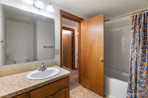 a bathroom with a sink and a toilet