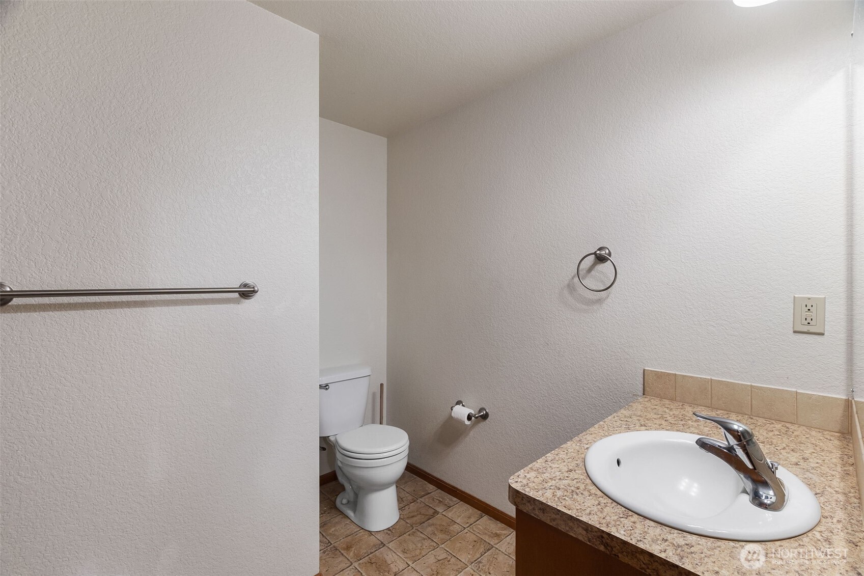 6107 189th Loop Southwest Rochester, WA 98579 - Photo 27 of 38 a bathroom with a sink and a toilet