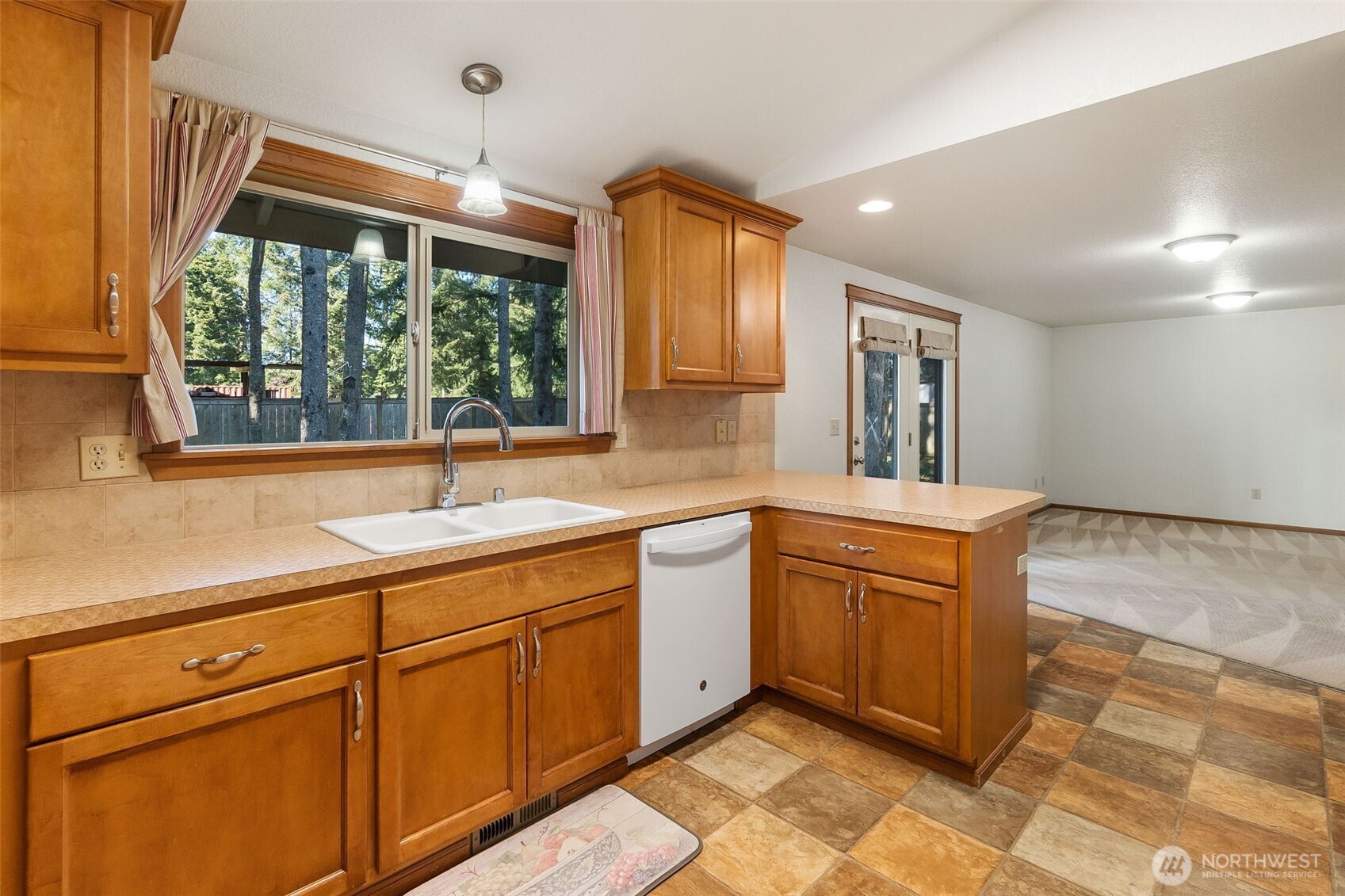 6107 189th Loop Southwest Rochester, WA 98579 - Photo 5 of 38 a spacious bathroom with a sink mirror and a bathtub