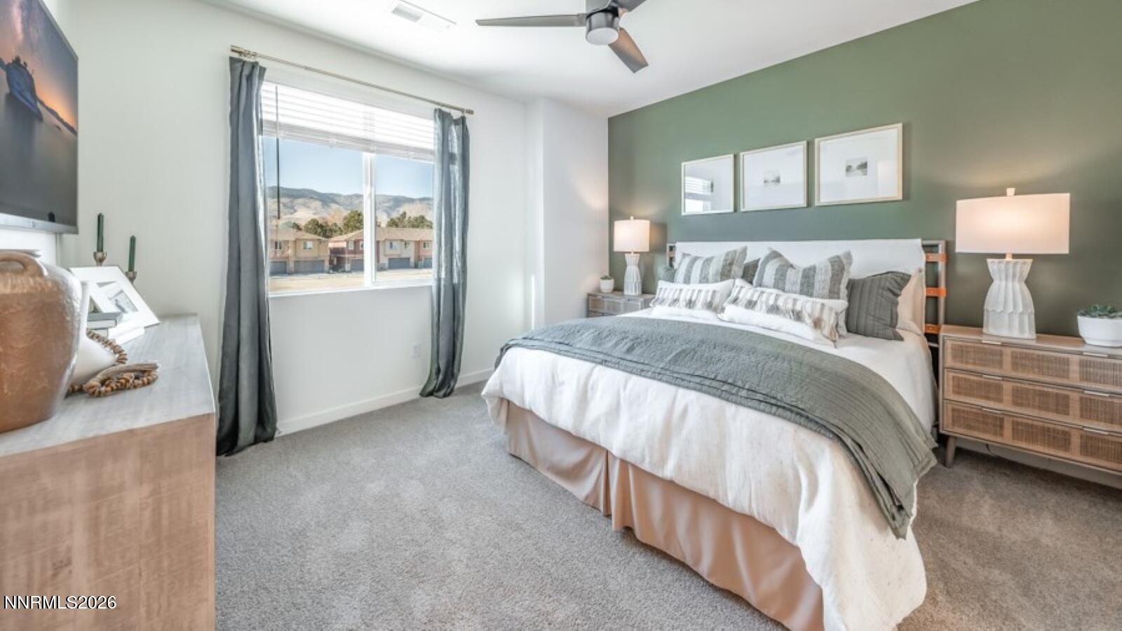 1008 Middle Gate Road Carson City, NV 89701 - Photo 17 of 23 a spacious bedroom with a bed and a window