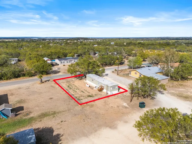 an outdoor space with view of city