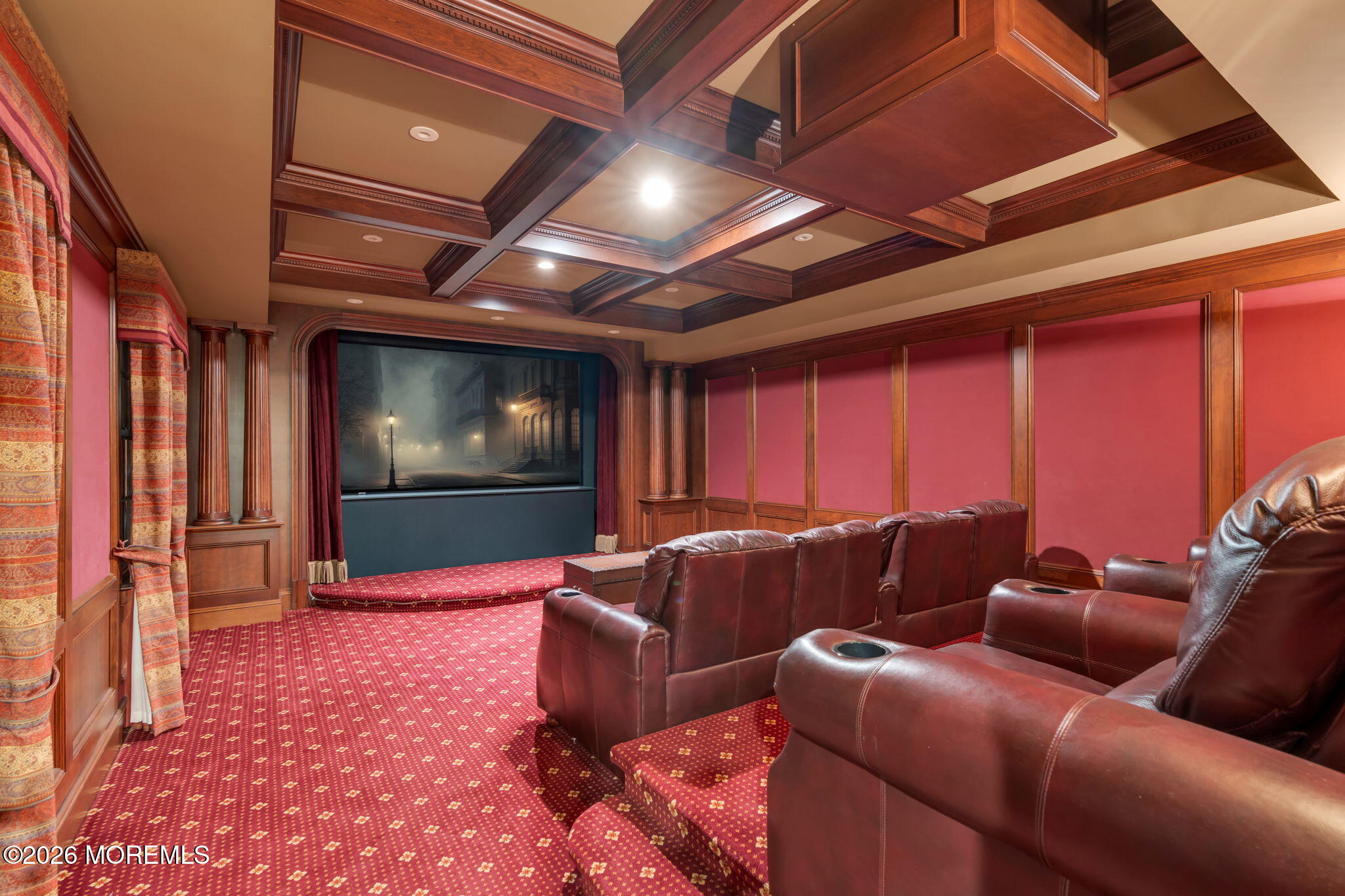 672 Winding River Road Brick, NJ 08724 - Photo 72 of 111 a media room with lots of chairs and a projector