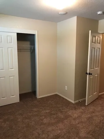 an empty room with closet