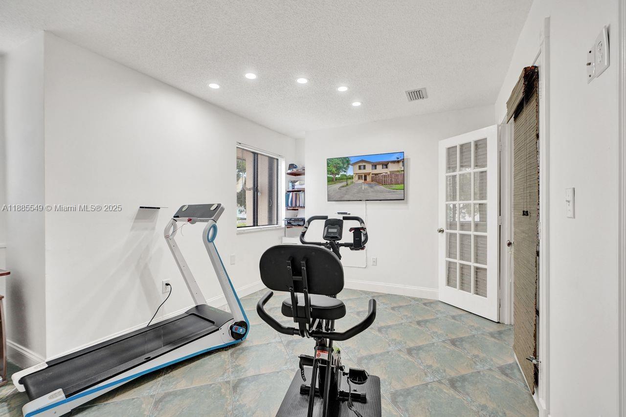 14201 Southwest 57th Lane, Unit 1A7 Miami, FL 33183 - Photo 31 of 48 a view of a workspace