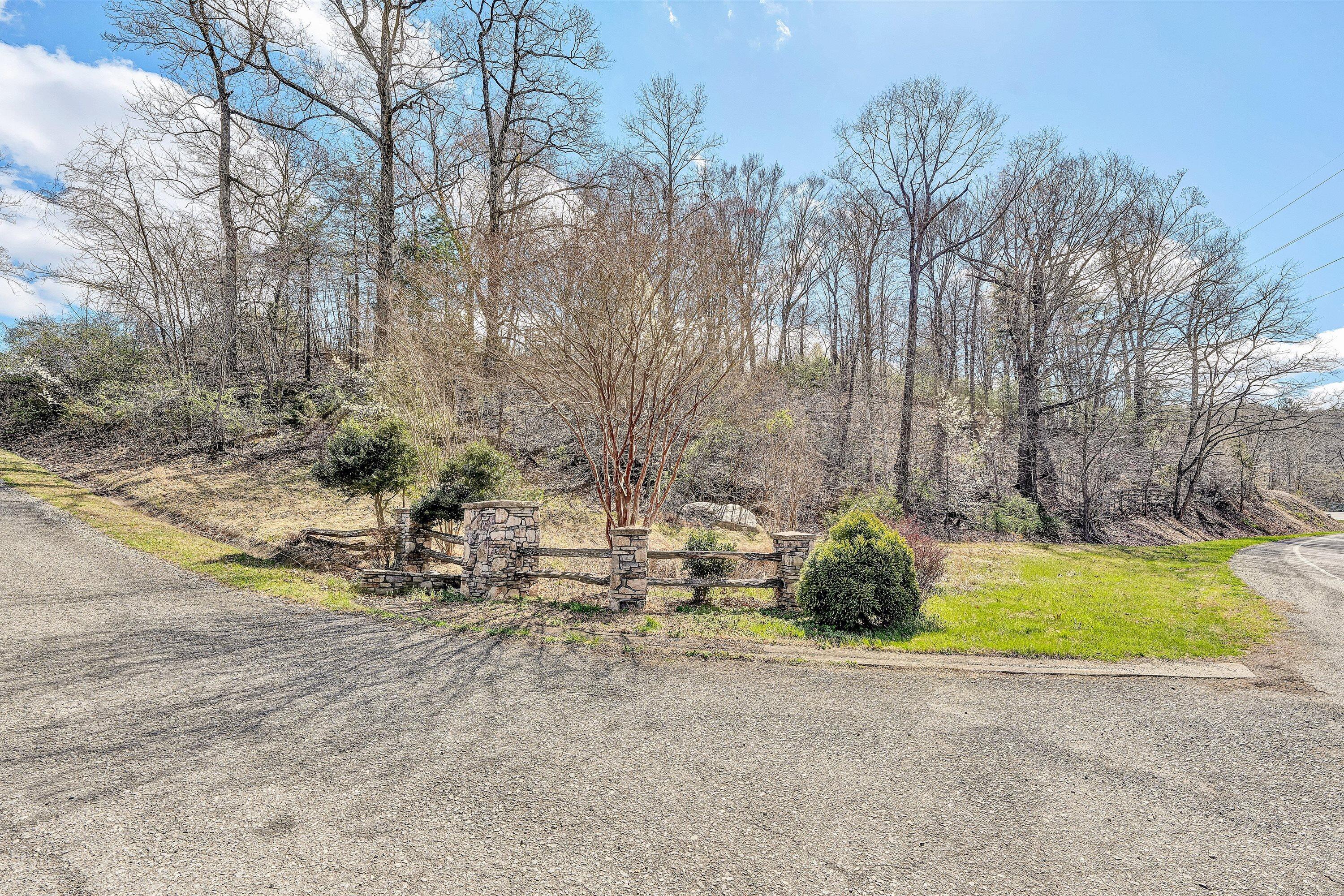 Lot 1 Springhouse Lane Rocky Mount, VA 24151 - Photo 6 of 14 a backyard of a house with table and chairs