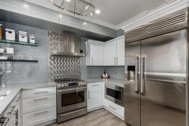 a picture of a bench in front of a wall