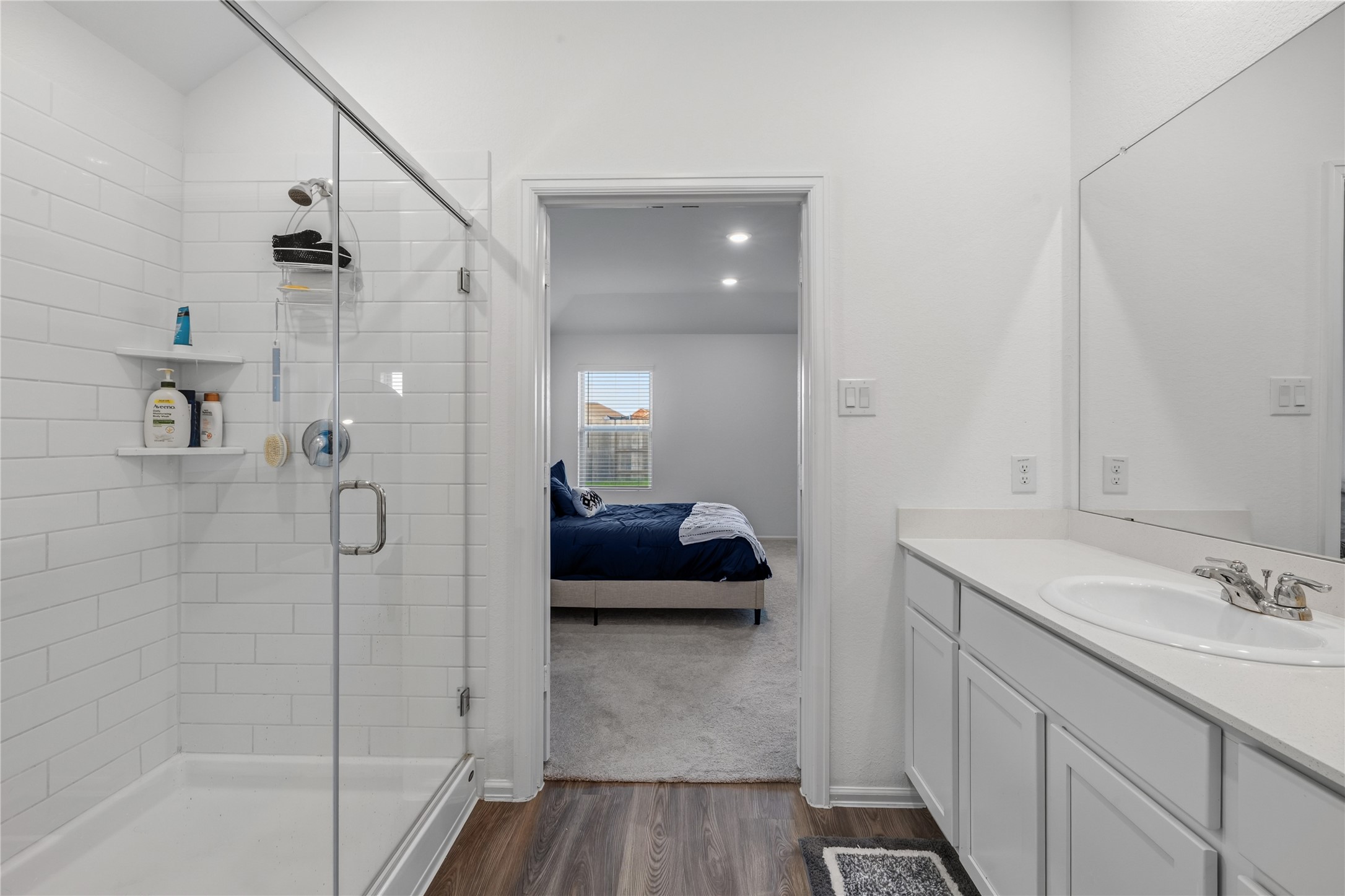 9906 Keystone Meadow Place Baytown, TX 77521 - Photo 19 of 42 Primary bathroom with large walk-in shower with bench!