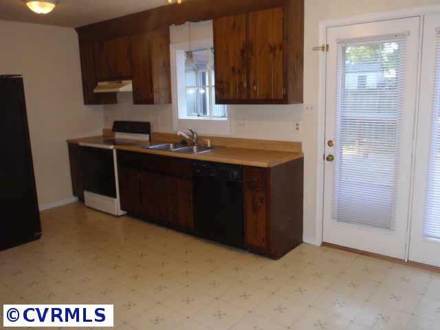 10206 Carol Anne Road Chesterfield, VA 23832 - Photo 3 of 7 a kitchen with a sink and cabinets