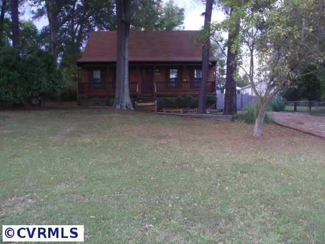 10206 Carol Anne Road Chesterfield, VA 23832 - Photo 7 of 7 a view of a house with a yard and tree