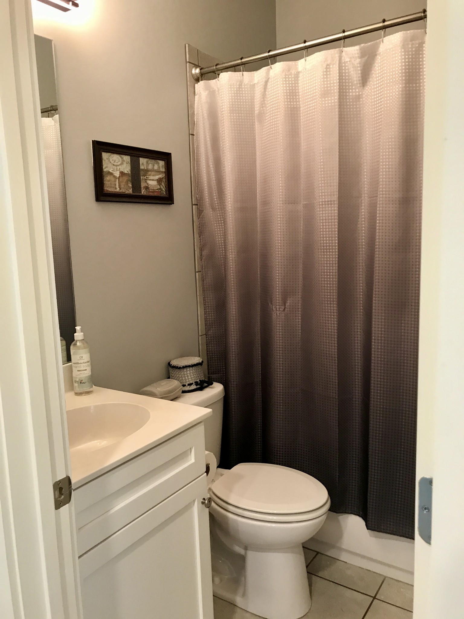 160 ANDERTON Drive Winchester, TN 37398 - Photo 13 of 35 a bathroom with a sink a toilet and a shower curtain