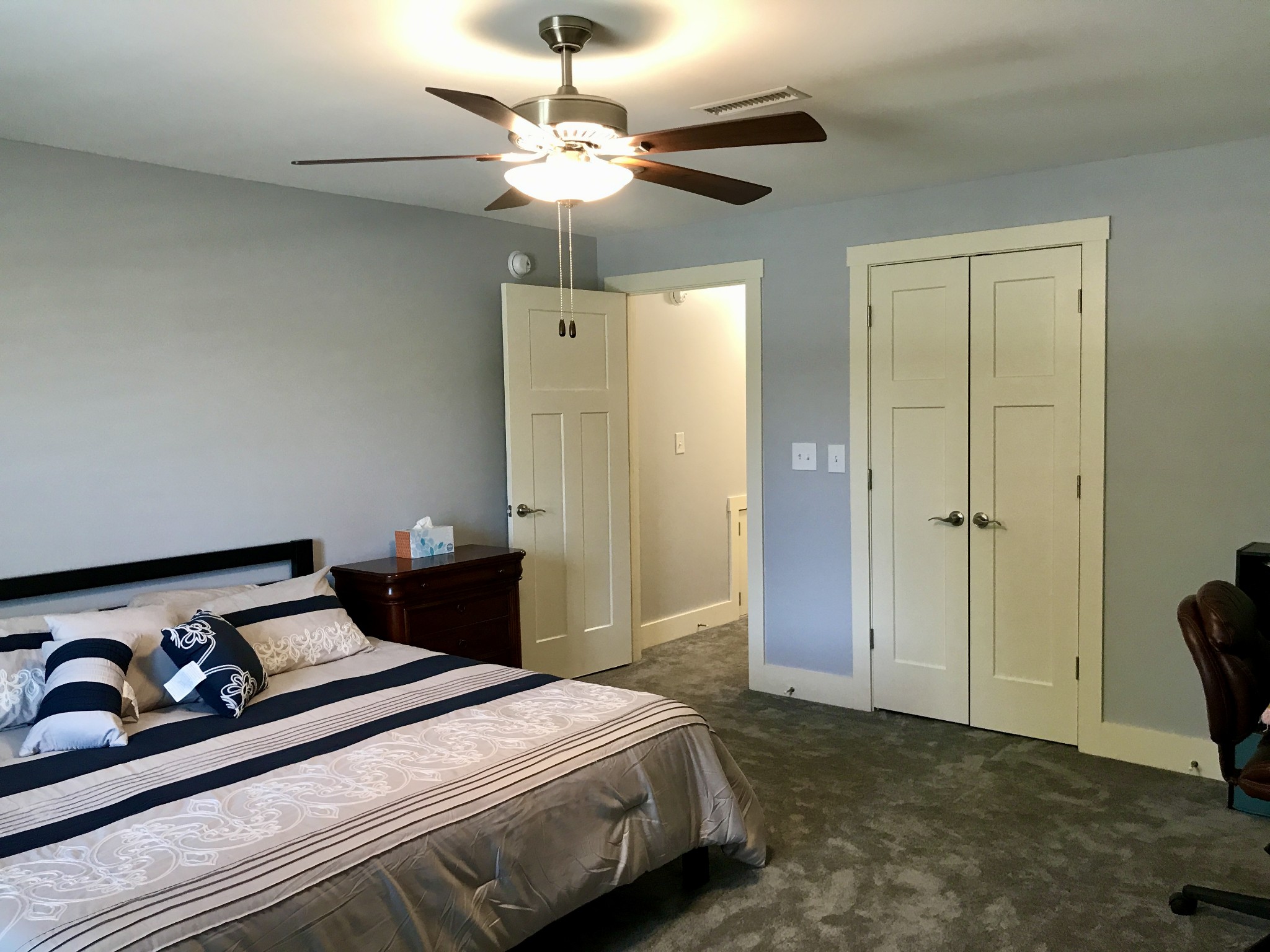 160 ANDERTON Drive Winchester, TN 37398 - Photo 18 of 35 a bedroom with a bed and a chandelier