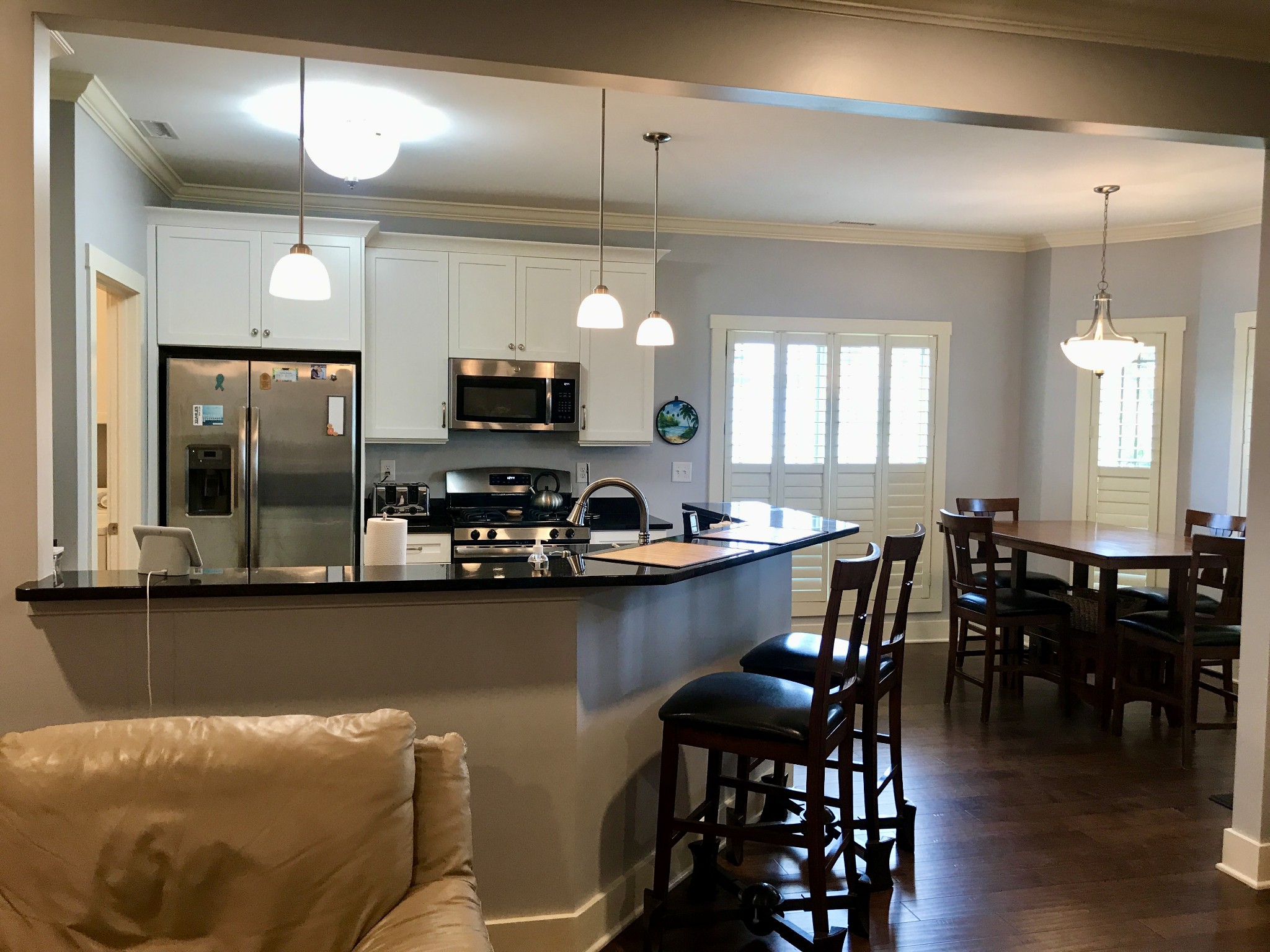 160 ANDERTON Drive Winchester, TN 37398 - Photo 6 of 35 a kitchen with stainless steel appliances granite countertop a sink a stove a dining table and chairs