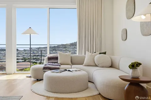 a living room with a couch and a table