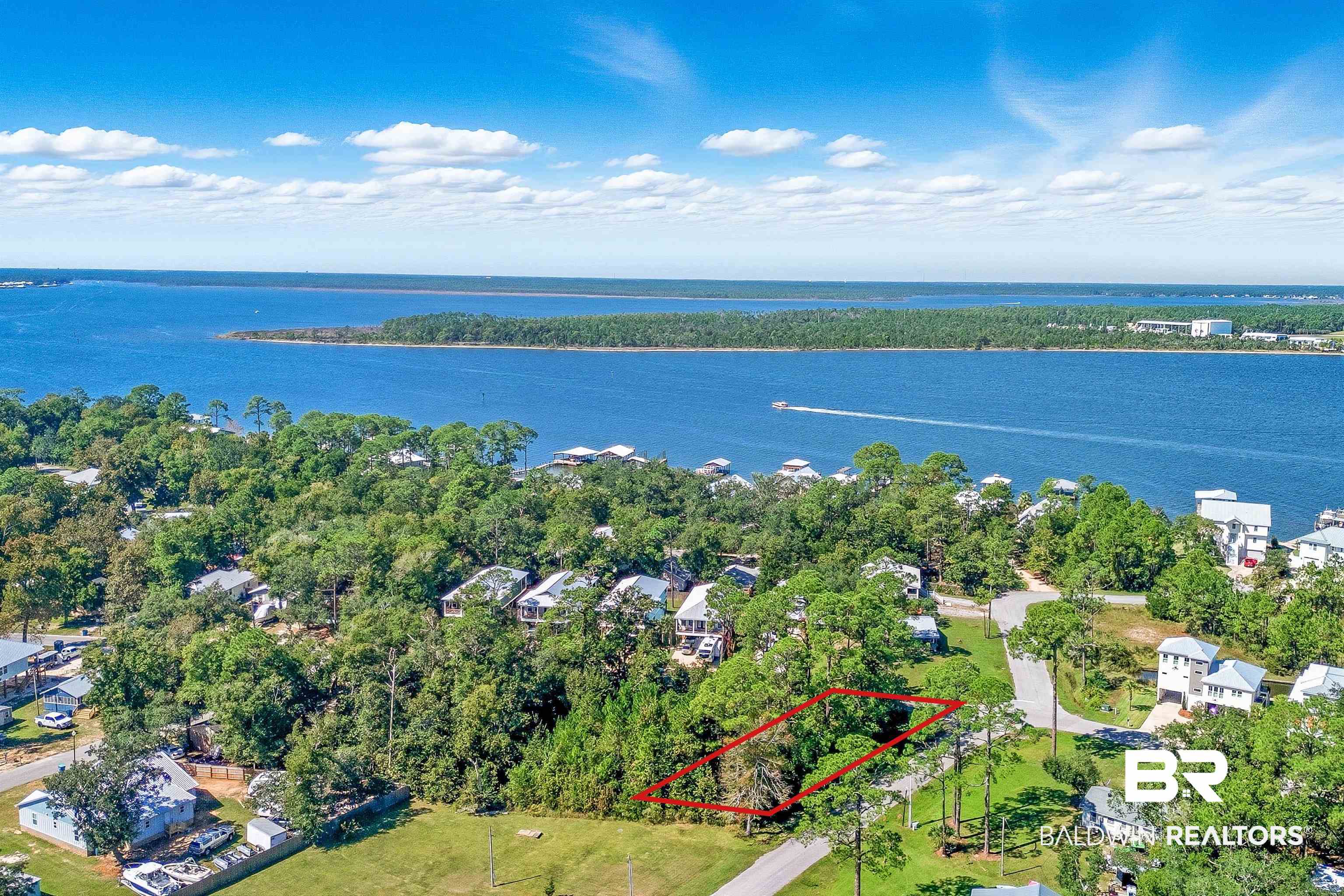 5310 Pine Road Orange Beach, AL 36561 - Photo 6 of 46 Aerial view of property's location featuring property boundaries highlighted and a large body of water