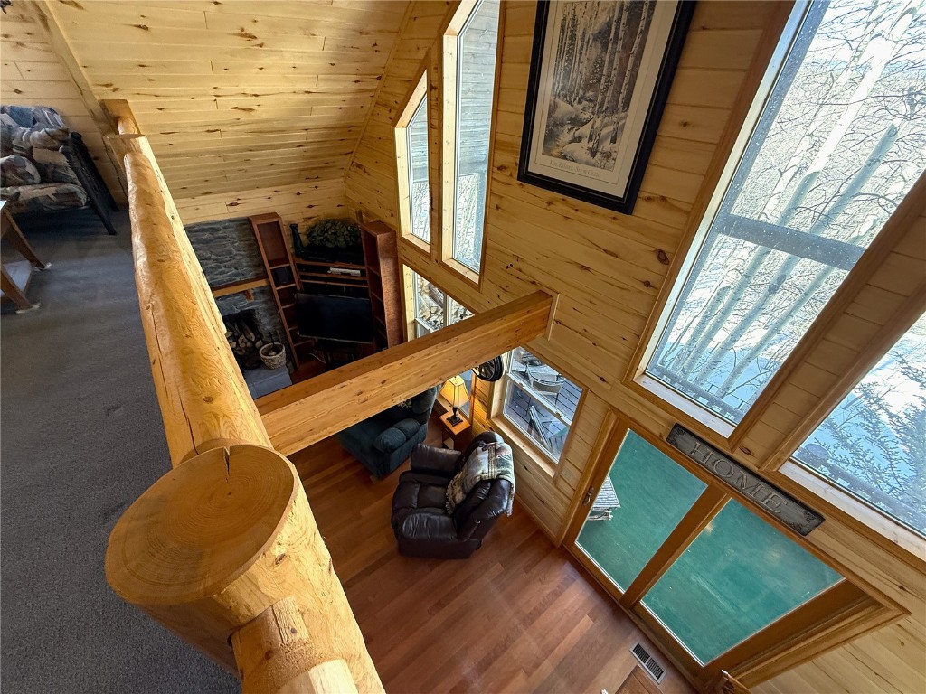 1387 High Creek Road Fairplay, CO 80440 - Photo 23 of 47 a view of a living room with furniture and a floor to ceiling window