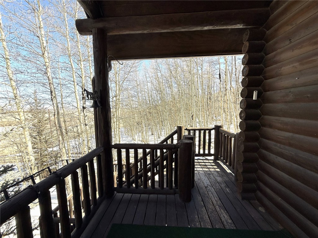 1387 High Creek Road Fairplay, CO 80440 - Photo 41 of 47 a view of a balcony with wooden floor