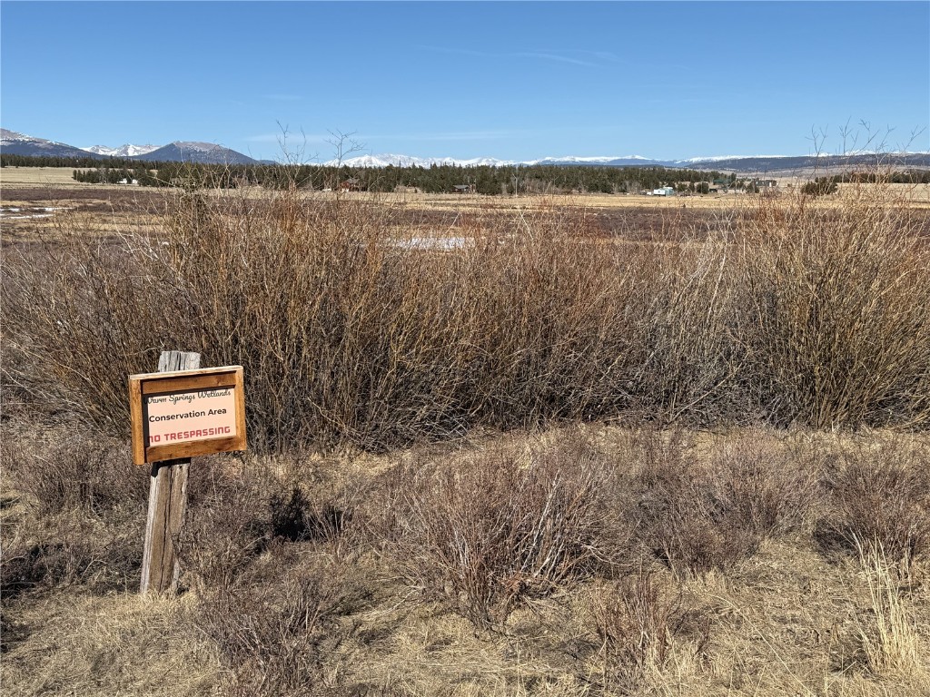 1387 High Creek Road Fairplay, CO 80440 - Photo 46 of 47 a view of a lake next to a building with a lake