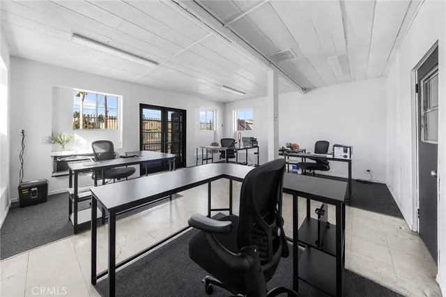 a bathroom with a sink toilet and a mirror