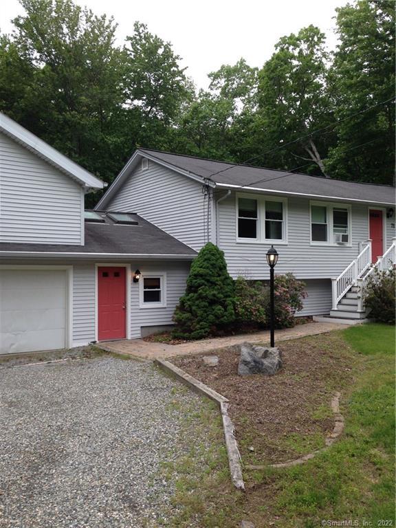 71 Airline Road Clinton, CT 06413 - Photo 1 of 1 a house that has a tree in front of it