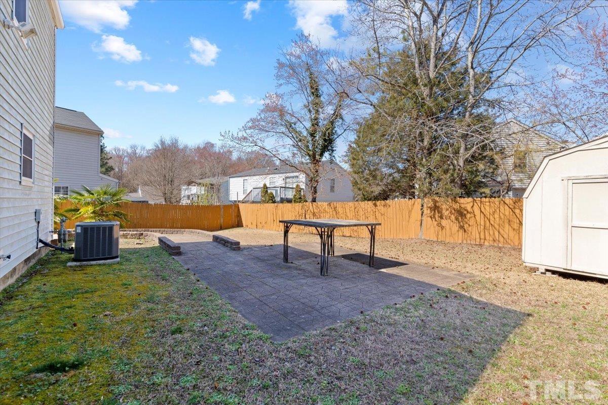 8224 Wynewood Court Raleigh, NC 27616 - Photo 28 of 29 a view of a park with swings and slides