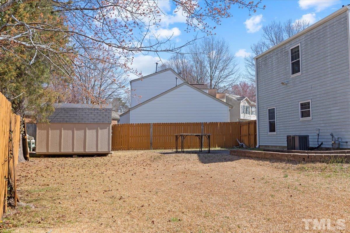 8224 Wynewood Court Raleigh, NC 27616 - Photo 29 of 29 a view of a backyard of a house