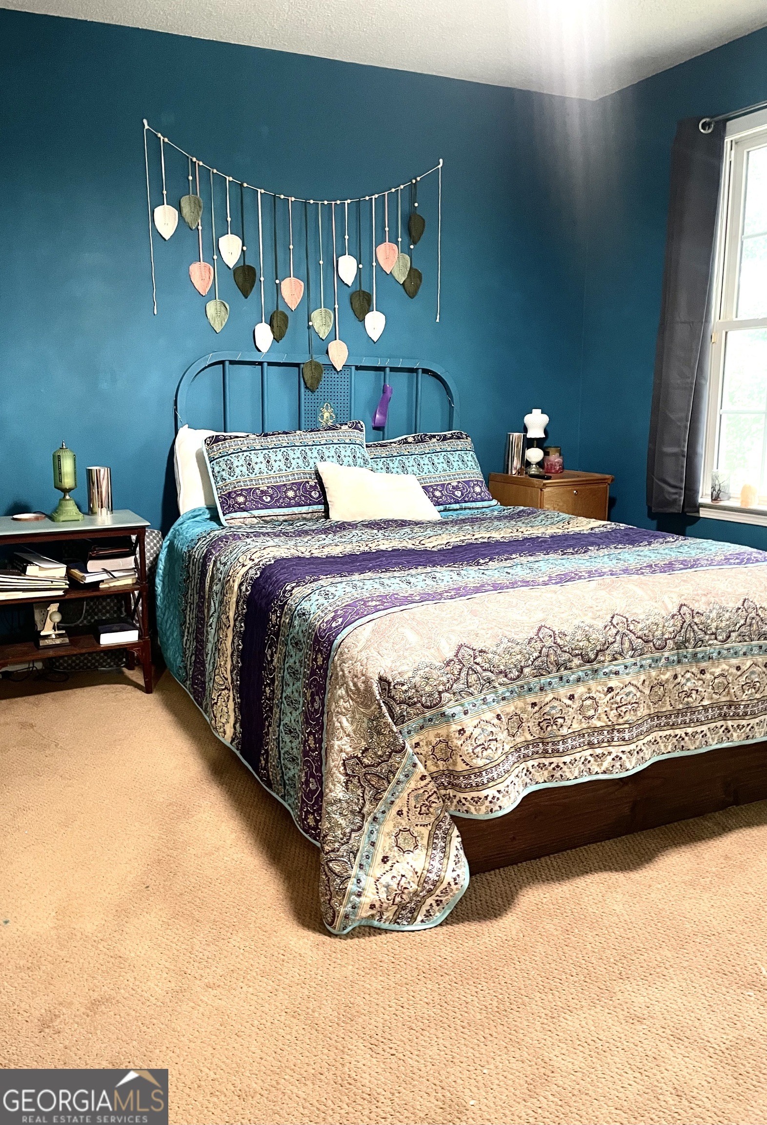 3010 Turner Church Road McDonough, GA 30252 - Photo 14 of 27 a bed sitting in a bedroom next to a window