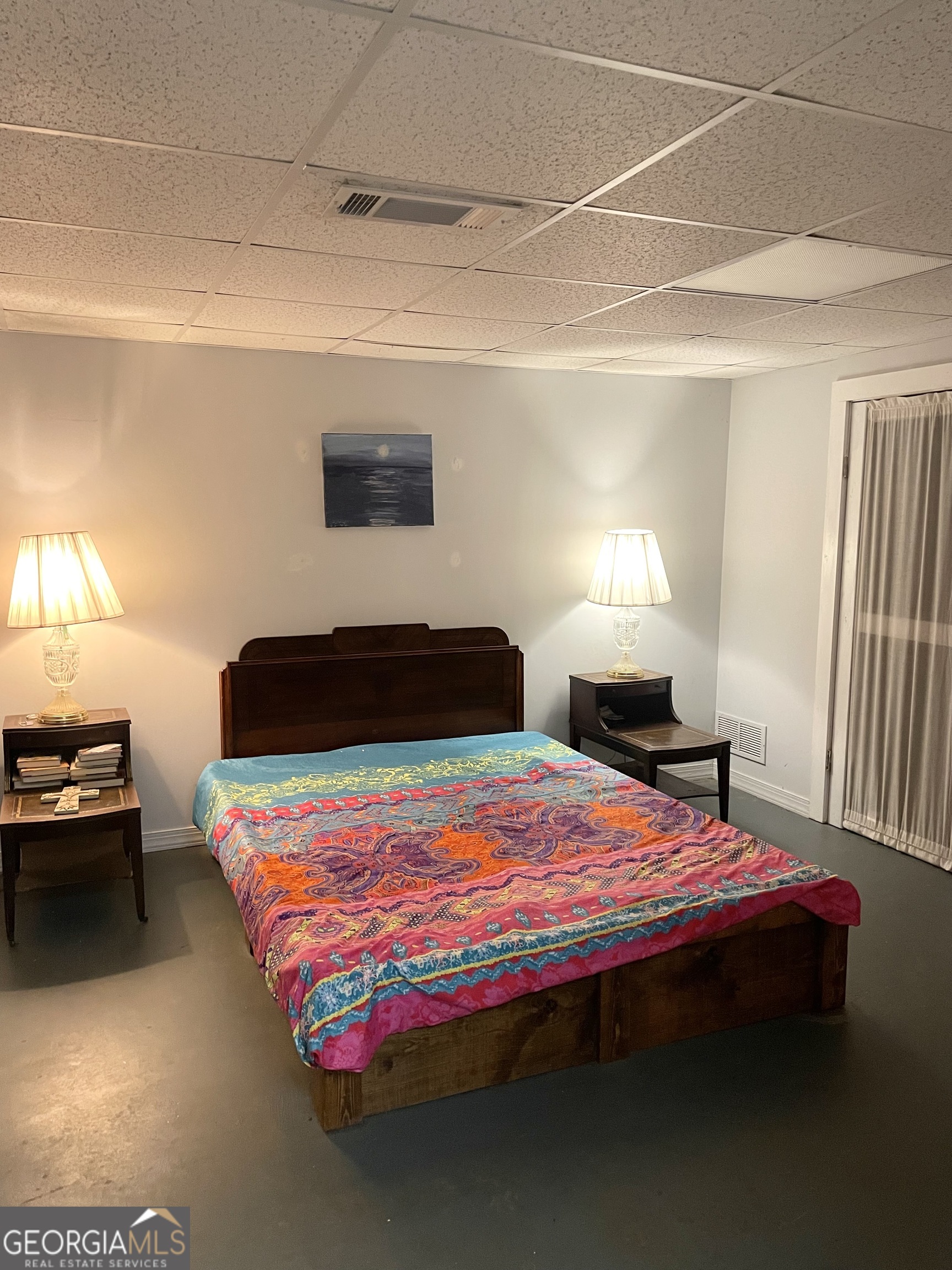 3010 Turner Church Road McDonough, GA 30252 - Photo 17 of 27 a bedroom with a bed and a lamp on dresser