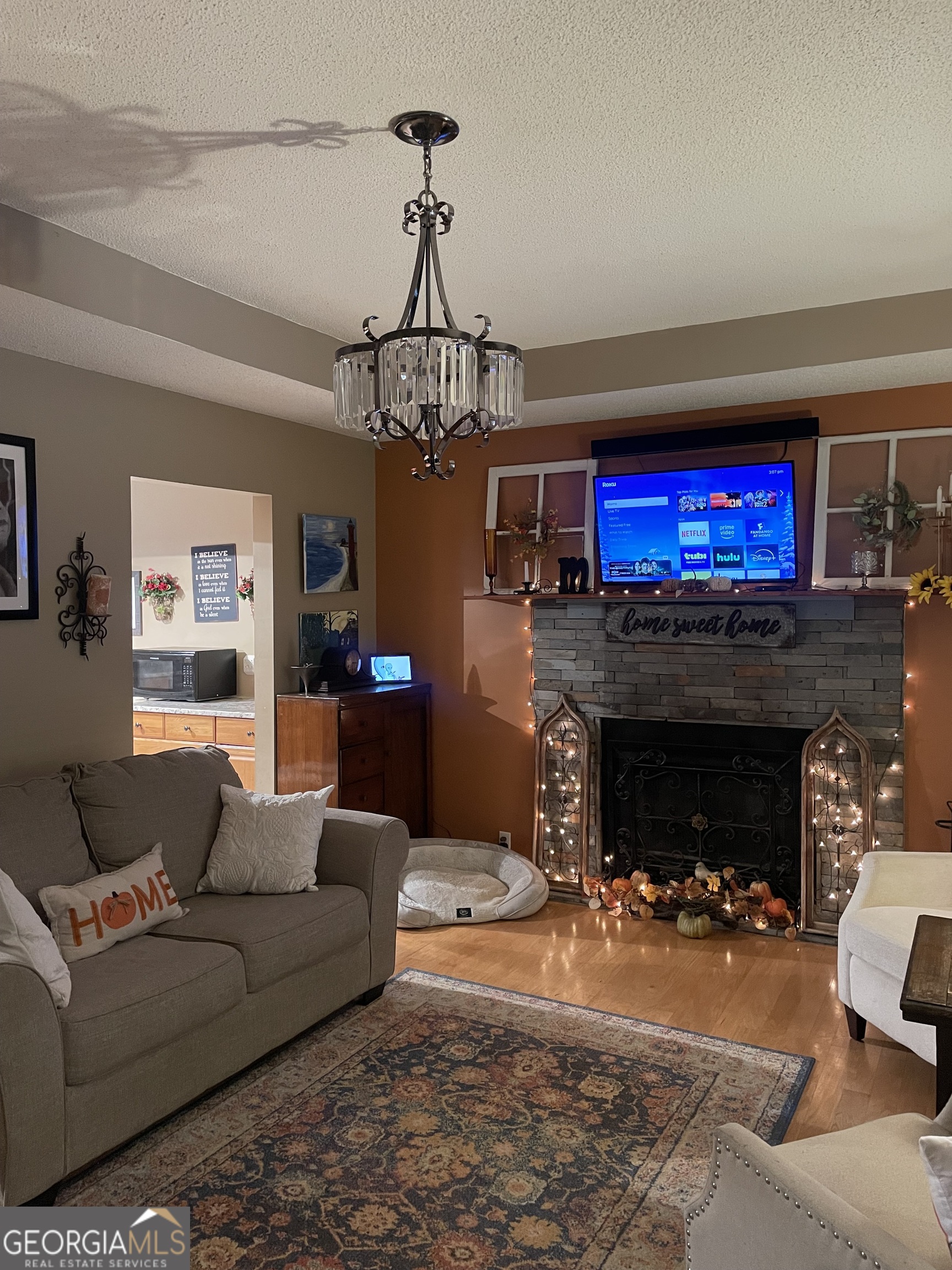 3010 Turner Church Road McDonough, GA 30252 - Photo 4 of 27 a living room with furniture and a fireplace