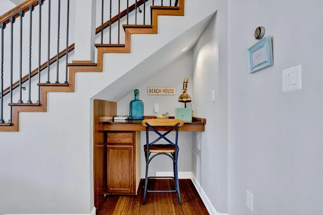 a view of entryway with wooden floor