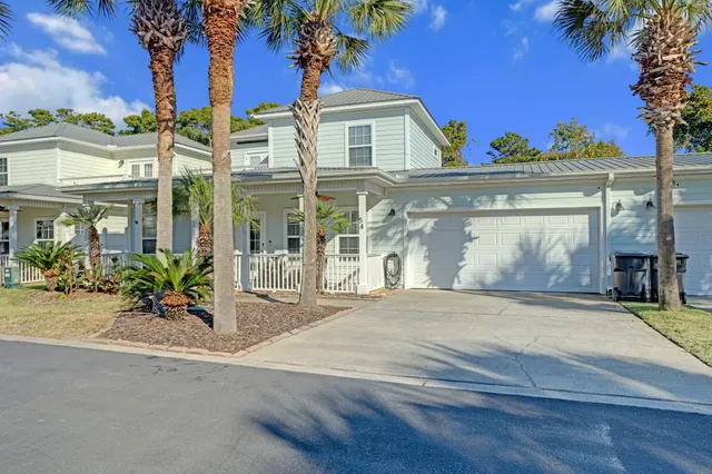 a view of a balcony with chairs