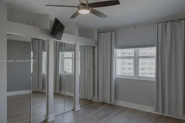a bathroom with a sink vanity and a mirror